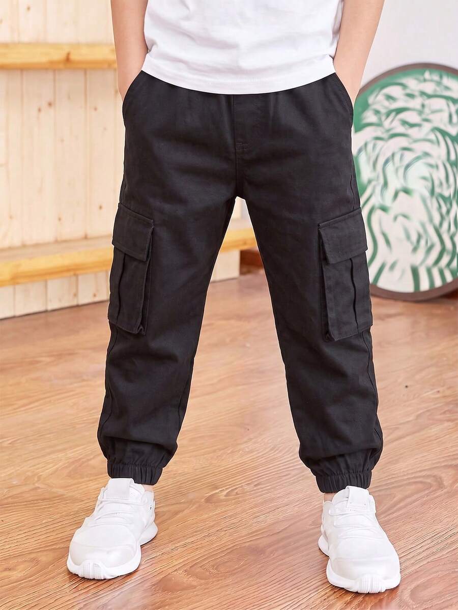 1pc 4-7 Years Old Young Boys' Solid Color Jogger Pants, Soft & Comfortable With Pockets, Classic Style Casual Trousers For All Seasons - Black - View 1