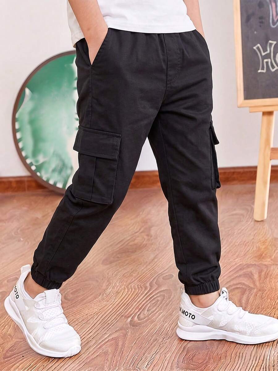 1pc 4-7 Years Old Young Boys' Solid Color Jogger Pants, Soft & Comfortable With Pockets, Classic Style Casual Trousers For All Seasons - Black - View 1