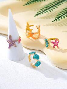 Bộ 4 chiếc nhẫn phong cách Bohemian lấy cảm hứng từ vỏ sò và sao biển, thích hợp cho kỳ nghỉ biển. - Vàng - Xem 3