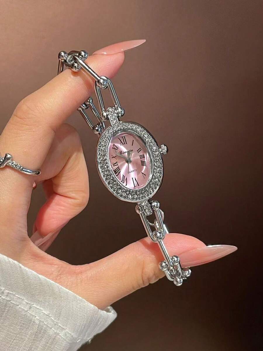 1 chiếc đồng hồ nữ dây hợp kim thời trang và thanh lịch, mặt số hình bầu dục, phong cách Anh cổ điển, đồng hồ thạch anh cao cấp, thích hợp cho các dịp lễ hội, tiệc tùng, đám cưới, tựu trường, Giáng sinh, Lễ Tạ ơn, Halloween, Lễ Phục sinh, và là món quà lý tưởng dành cho phụ nữ. - Bạc - Xem 1