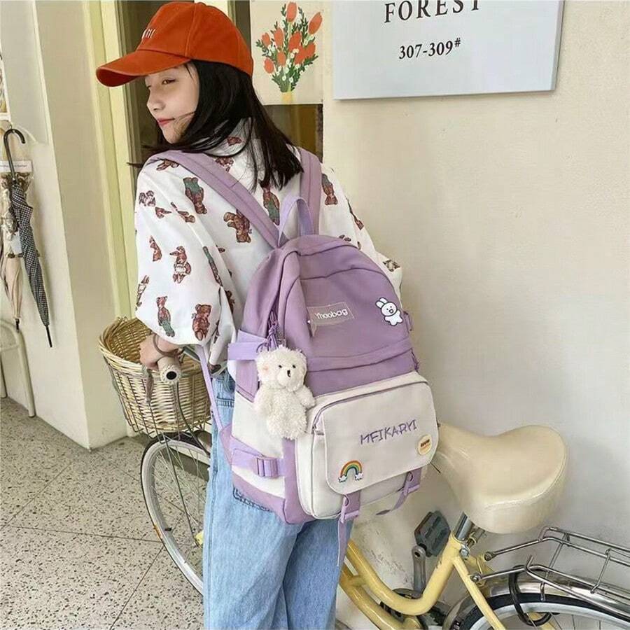 1個可愛紫色與白色筆電後背包,精美大容量14吋書包,附絨毛娃娃與徽章配件組。採用耐用牛津布製成,防水且耐用,適合大學校園、旅行與日常通勤。女孩理想的開學禮物。 - A - 查看 1