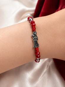 Pulsera Roja de la Santa Muerte , amor , pasión y protección en una sola pieza, esta diseñada para atraer el amor , fortalecer vínculos y potenciar tu energía emocional.  Con cristales brillantes , hilo ajustable y dije en tono plata, combina estilo y significado espiritual. - Rojo - Ver 1