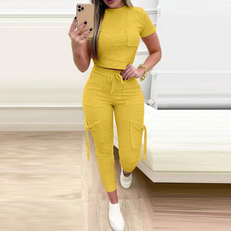 Conjunto ajustado de dos piezas de Color sólido para mujer, camiseta recortada, pantalones largos ajustados, conjuntos de bolsillo con cordones para mujer, ropa deportiva para primavera y verano 2023 - Amarillo - Ver 1