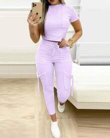 Conjunto ajustado de dos piezas de Color sólido para mujer, camiseta recortada, pantalones largos ajustados, conjuntos de bolsillo con cordones para mujer, ropa deportiva para primavera y verano 2023 - Morado - Ver 5