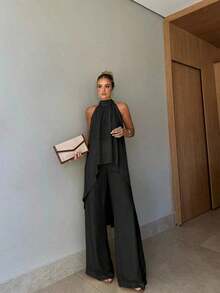 2 piezas Conjunto de top halter anudado de unicolor elegante y pantalones largos con bajo asimétrico, adecuado para fiesta, vacaciones, calle, cita, primavera/verano - Negro - Ver 1