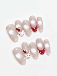 Bộ 10 móng tay mang tên Cherry-Eye. Bộ móng này có lớp nền màu nude sữa mộng mơ kiểu mắt mèo với những chấm bi trắng tinh tế, điểm nhấn là những chấm bi đỏ ở đầu móng kiểu Pháp và họa tiết quả anh đào 3D dễ thương. Lớp sơn bóng tạo nên vẻ ngọt ngào, cổ điển, giống như một món tráng miệng anh đào hảo hạng trên đầu ngón tay bạn. - Nhiều màu - Xem 2