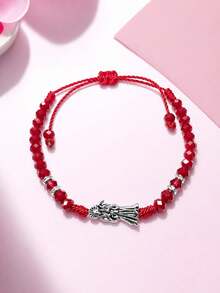 Pulsera Roja de la Santa Muerte , amor , pasión y protección en una sola pieza, esta diseñada para atraer el amor , fortalecer vínculos y potenciar tu energía emocional.  Con cristales brillantes , hilo ajustable y dije en tono plata, combina estilo y significado espiritual. - Rojo - Ver 2