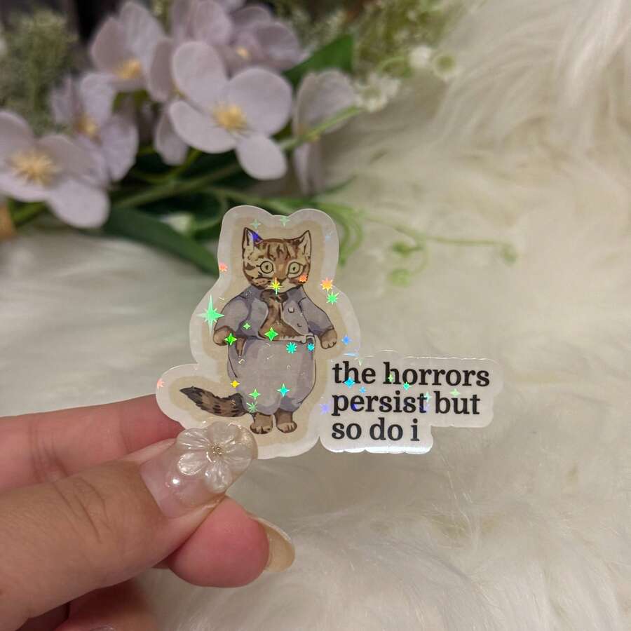 The Horrors Persist But So Do I Cat Sticker, Waterproof Vintage Meme Vinyl Decal - Star Film - View 1