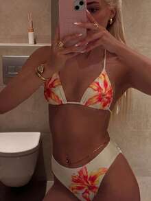 Bộ bikini dây buộc cổ họa tiết hoa gợi cảm dành cho nữ, kiểu dáng thời trang và thoải mái, phù hợp cho kỳ nghỉ hè, đi biển và các dịp lễ hội. - trái cam - Xem 5