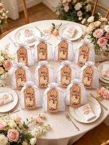 60 piezas/20 sets Regalos para fiesta de baby shower, Suministros para fiesta de revelación de género, Llavero de cochecito de bebé dorado con tarjeta de bolsa de arena y cuerda de yute, Adecuado para baby shower de boda - Multicolor 2 - Ver 4