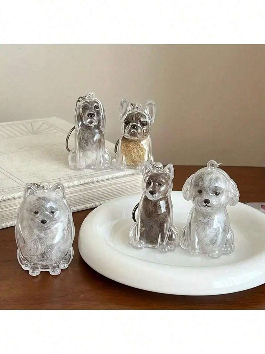 1个PET材质坐姿狗狗造型钥匙扣 - 高品质PET材质狗狗造型，带链条，适合养狗人士 - 兼具实用价值的钥匙扣，可收纳和保护宠物毛发，可挂在钥匙、包包和户外用品上 - 适合作为爱狗人士的纪念品