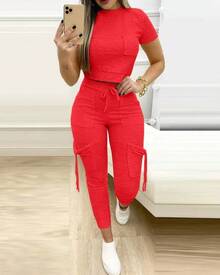 Conjunto ajustado de dos piezas de Color sólido para mujer, camiseta recortada, pantalones largos ajustados, conjuntos de bolsillo con cordones para mujer, ropa deportiva para primavera y verano 2023 - Negro - Ver 4
