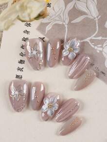 10片装美甲贴片套装，包含杏仁色、薰衣草色、猫眼色、蓝色花朵和金色短款美甲贴片，内含1张粘性贴纸和1个迷你指甲锉。 - 彩色 - 查看 1