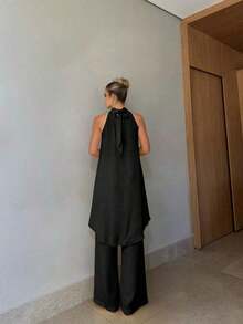 2 piezas Conjunto de top halter anudado de unicolor elegante y pantalones largos con bajo asimétrico, adecuado para fiesta, vacaciones, calle, cita, primavera/verano - Negro - Ver 2
