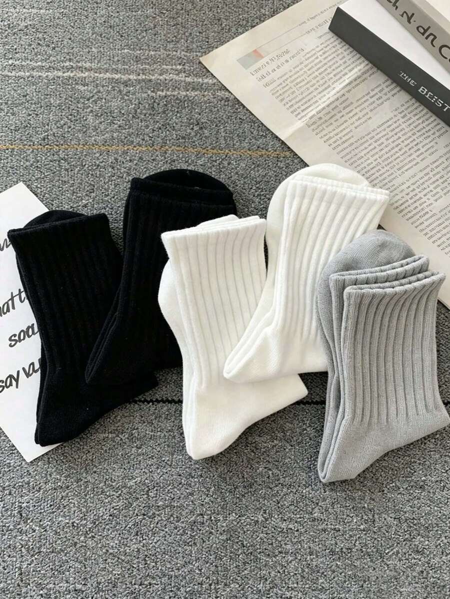 3/6 双装,包含黑色、白色、灰色和三色混色罗纹袜。这些舒适透气的中筒袜,男女皆宜,纯色款包括黑色和白色。设计柔软透气,适合户外运动。 - 彩色 - 查看 1