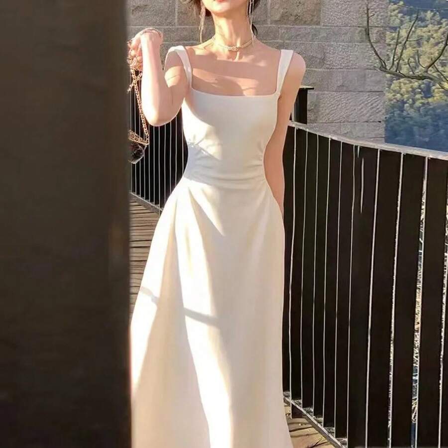 2025Vestido nuevo de verano con forro blanco para mujer, vestido de tirantes francés con diseño adelgazante que se ajusta a la cintura. - Blanco - Ver 1
