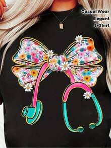 Women's Floral T-Shirt With Bow - Elegant Nursing Blouse With Floral Details, Stretchy Work Shirt For Nurses And Healthcare Professionals - Soft Clothing For Everyday Wear In The Hospital (Spring-Autumn-Summer) - Ideal Gift For Nurses, Nurse Shirt, Casual Wear - 黑色 - 查看 1
