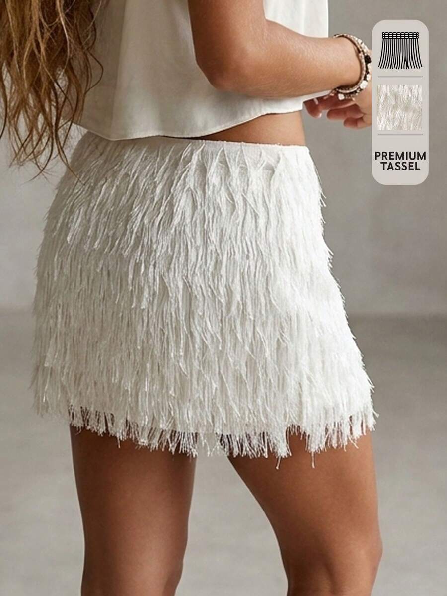 Rouah Make A Bold Statement With This Stunning White Feather-Effect Fringe Mini Skirt. Featuring All-Over Tiered Tassels That Move With You, This Textured Statement Piece Is The Ultimate Choice For SS26 Festivals, Summer Parties, And Glamorous Nights Out. Pair It With A Simple Bodysuit To Let The High-Volume Fringe Take Center Stage - Apricot - View 1