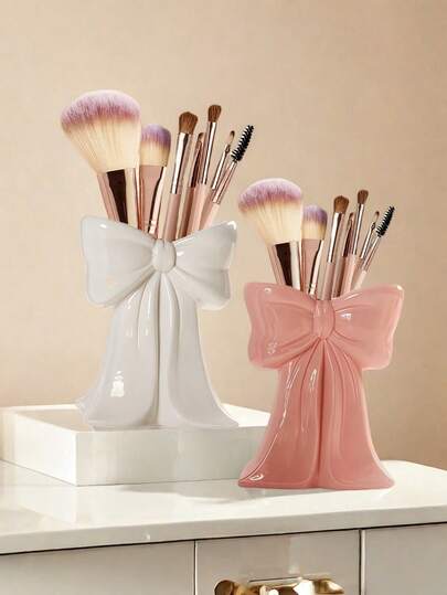 1 pieza Caja de almacenamiento con forma de lazo, adecuada para contener brochas de maquillaje y cosméticos. Este elegante soporte para brochas de maquillaje es excelente para niñas, estudiantes y decoración del hogar creativa. También es adecuado para vacaciones, playa, baño, dormitorio y otras ocasiones. Gran capacidad.