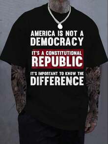 Patriotic T-Shirt With The Message 'America Is Not A, But A Constitutional Republic' In White Letters, Designed For Comfortable Everyday Casual Wear For America Supporters. - Black - View 1