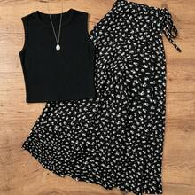 UREREM Bộ đồ hè 2 món dành cho nữ, áo tank top không tay bằng cotton kết hợp với chân váy midi họa tiết hoa nhí, trang phục đi nghỉ hè thanh lịch và thoải mái, màu đen. - màu đen - Xem 1