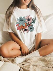 Camiseta casual de talla grande, camiseta de manga corta con estampado floral para mujer, cuello redondo ligeramente elástico - Negro - Ver 7