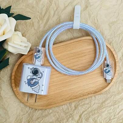 Bộ 5 món gồm ốp bảo vệ cáp sạc hình phi hành gia và tên lửa, bao đựng cáp sạc, bộ sắp xếp dây cáp bằng silicon, tương thích với điện thoại Apple.