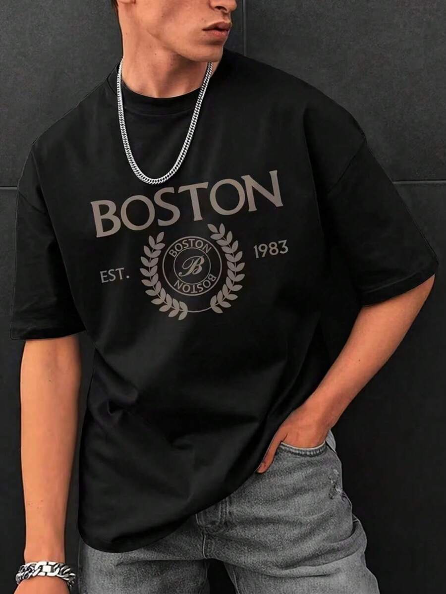 1 pieza de camiseta unisex de manga corta y cuello redondo, holgada, de 180 g, diseñada por artistas de Y2K en el estilo Bababask, hecha de 100% algodón puro.Son informales y versátiles, adecuados para ropa urbana, salidas diarias, campamentos, conciertos, eventos de hip-hop, rock y rap, y presentan diseños inspirados en celebridades.Ideal para festivales, otoño y uso durante todo el año. - Negro - Ver 1
