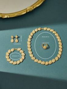 This Luxurious Gold-Tone Jewelry Set Features Fully Paved Leaf-Shaped Ornaments, Suitable For Galas, Parties, Formal Events, Daily Wear, Wedding Dresses. The 5-Piece Set Includes Necklace, Earrings, Ring, Bracelet, All Adorned With Cubic Zirconia Stones. A Sparkling Gift For Girlfriend Or Mother. - four piece set - View 4