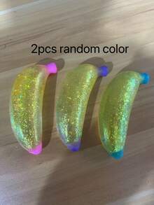 1个闪亮焦糖亮片香蕉造型挤压玩具，柔软弹性TPR材质，带金色亮片，慢回弹减压玩具，可重复使用，透气防压，柔软挤压玩具，女士礼物 - 彩色 - 查看 12