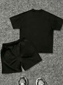 (2-Piece Outfit)  Angel Skull Pattern Men's Round Neck Short Sleeved Sports Shirt+Drawstring Shorts, Casual And Comfortable,Streets,Vacation Wear. - 黑色+黑色 - 查看 2