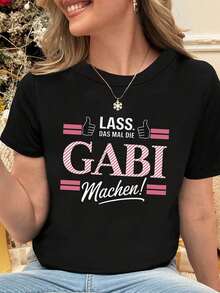 Diseño Sencillo y Versátil: "El Momento de Confianza de Gabi" en alemán: "LASS DAS MAL DIE GABI Machen!" Camiseta de Algodón para Mujer con Estampado de Gesto de Pulgar Arriba, Cuello Redondo, Estilo Casual, para Primavera y Verano. - Negro - Ver 6