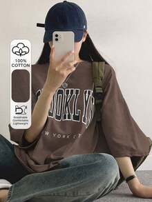 Camiseta holgada para mujer con estampado de letras, camiseta oversize, camisetas gráficas para Pascua.Y2K style,Fashionable styel,2026 newest,cute style,Causal style.180g(S-XXXL)) - Marrón - Ver 1