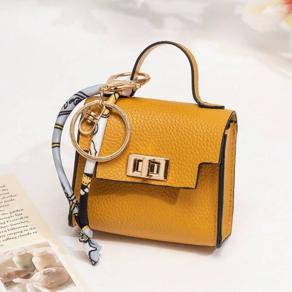 Llavero mini multicolor para mujer, lindo dije de bolso pequeño de cuero, llavero mini de bolso de color aleatorio, soporte portátil para estuche de auriculares, colgante de bolso bohemio, accesorios y regalos de moda para llaves