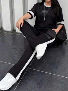 Conjunto de 2 piezas de camiseta de manga corta de cuello redondo y pantalones sueltos de cintura elástica para mujer, uso casual diario, elegante para primavera/otoño y verano - Blanco y Negro - Ver 9