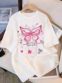 Nuevo lanzamiento otoño-invierno 2025: Camiseta de manga corta para mujer con cuello redondo, cut relajada y versátil. Presenta un estampado exclusivo con motivos de mariposas y corbata en el pecho. Tejido ultra suave con gran caída, ideal como base de look casual o elegante - Blanco 1 - Ver 7