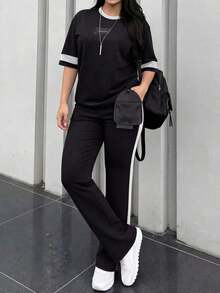 Conjunto de 2 piezas de camiseta de manga corta de cuello redondo y pantalones sueltos de cintura elástica para mujer, uso casual diario, elegante para primavera/otoño y verano - Blanco y Negro - Ver 4