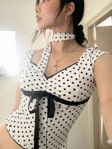 1条经典波点图案女士丝巾，尺寸4*95厘米，高品质长款真丝丝巾，优雅黑白配色，多功能春夏（四季皆宜）配饰，也可作发带、腰带、领带、项链或其他女士配饰使用。 - 彩色 - 查看 4