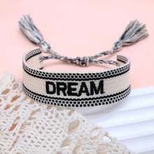 1条绣有“DREAM”字母的手工编织休闲可调节手链，适合派对和日常佩戴。 - 黑與白 - 查看 2
