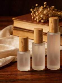 1個旅行護膚瓶，可重複填充便攜式50ml/30ml迷你噴霧瓶。緊湊磨砂玻璃配木紋瓶蓋。適用於香水、古龍水、化妝水和乳液。非常適合學校、旅行、海灘度假、商務出差和日常攜帶。 - 查看 6
