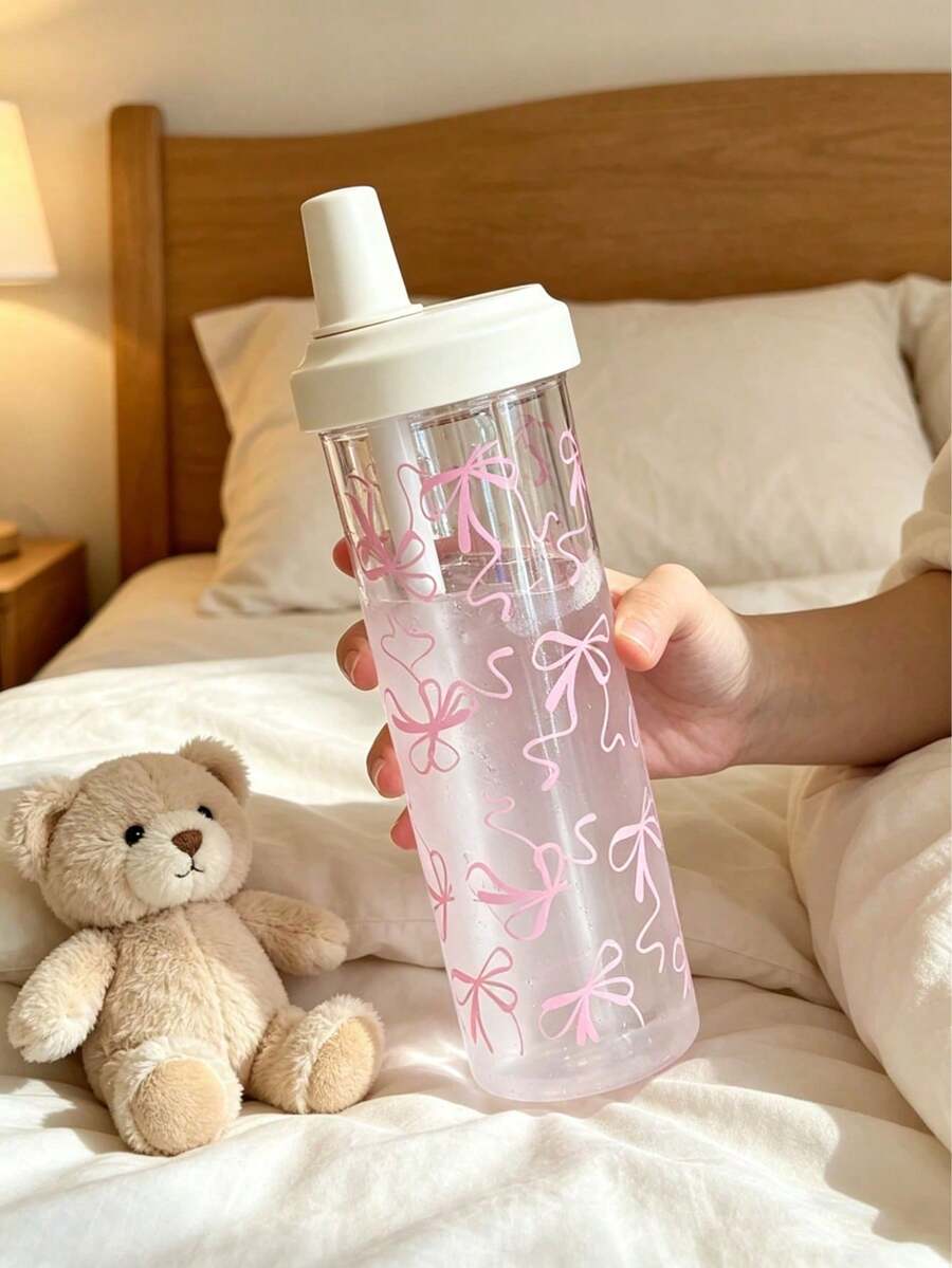 1个700毫升可爱粉色蝴蝶结水瓶，仿珍珠奶茶风格塑料饮水杯，大容量配粗吸管，防漏日常杯，适合学生、办公室、旅行、户外、露营，是送给女性、母亲、祖母的绝佳礼物。
