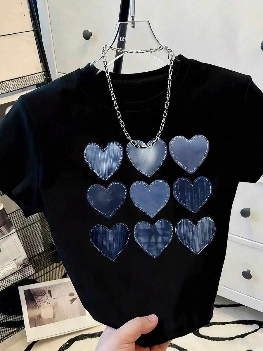 Primavera/Verano 2026, Nuevo Estilo, Camiseta Casual de Manga Corta para Mujer con Cuello Redondo y Estampado de Corazón, Estilo Vintage Urbano, Unisex, Holgada, de Algodón.