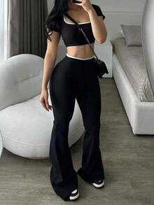 Conjunto informal de primavera y verano para mujer con top negro corto de cuello redondo y pantalones acampanados, conjunto de 2 piezas con ribete de contraste, adecuado para salir - Negro - Ver 1