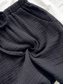 Top sin espalda con textura y lazo, holgado y casual para vacaciones, shorts casuales con elástico en la cintura y bolsillos, para playa y mar - Negro 2 - Ver 7