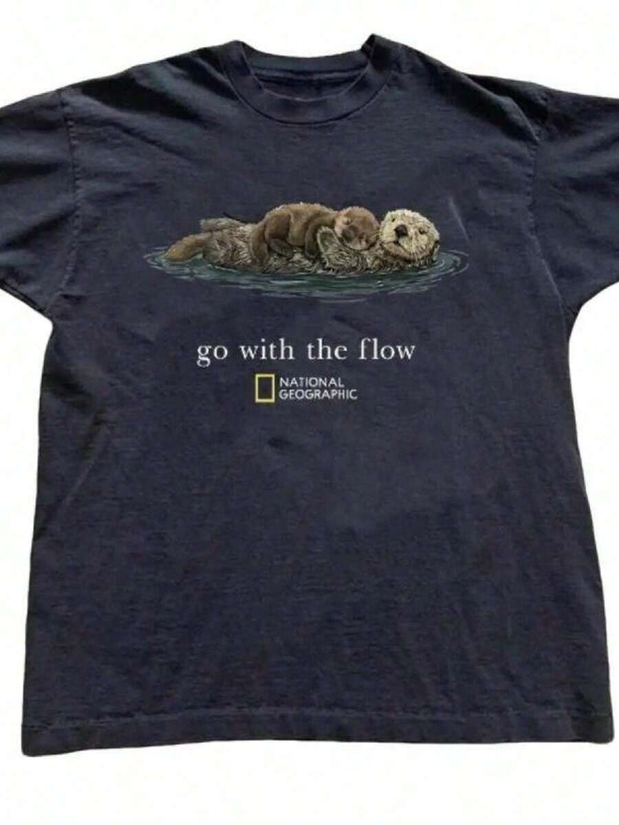 Nueva Llegada 2026: Camiseta Unisex "Go With The Flow" de National Geographic, Estilo Holgado y Relajado, Tejido Suave y Transpirable, 100% Algodón, Moda para Uso Diario, Camiseta de Mujer con Estampado Gráfico. - Negro - Ver 1