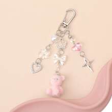 1 chiếc mặt dây chuyền hình gấu hồng dễ thương có nơ, móc khóa hình trái tim rỗng đính đá hình cỏ bốn lá trong suốt, phụ kiện túi xách nữ tính sáng tạo. - Hồng - Xem 3