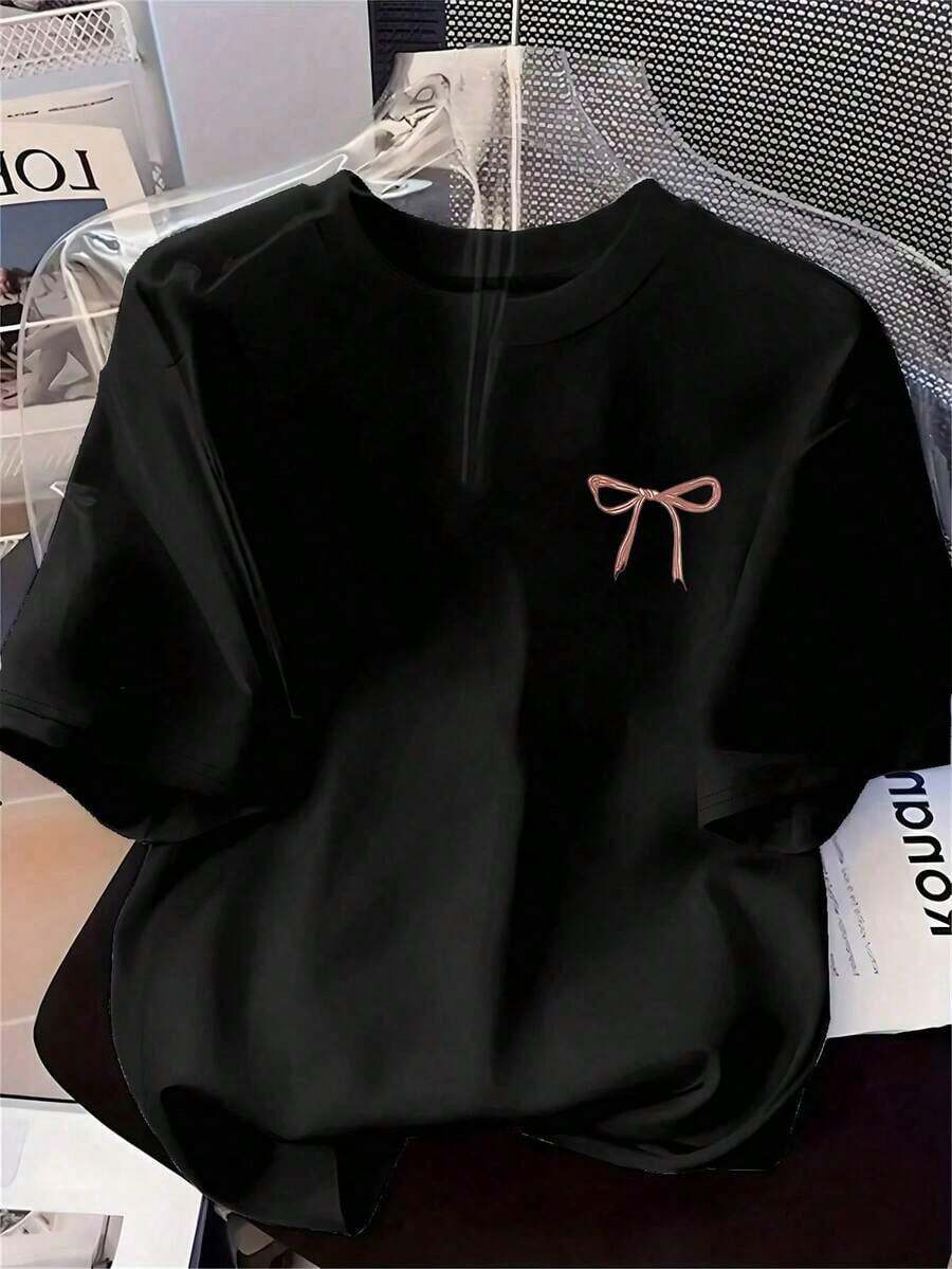 Camiseta oversize de verano para mujer con estampado de mariposas, estilo informal y detalle de lazo. Talla. LFTF - Negro - Ver 1