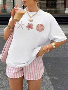 Camiseta de manga corta para mujer, estilo casual de verano, con estampado de conchas y estrellas de mar, cuello redondo, color albaricoque, versátil y a la moda para el uso diario en vacaciones.Camiseta Blanca Estampada para Mujer - Blanco - Ver 1