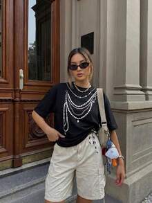 T-shirt décontracté pour femmes à col rond et manches courtes, Top d'été ample avec imprimé unique de chaîne de perles. Convient pour les vacances à la plage et le port quotidien - Noir - Voir 3