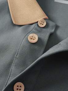 This Polo Shirt Features A Disney Mickey Mouse 'M' Logo Printed On The Chest. Made From Polyester, It Combines A Stylish Business-Casual Look With Breathability And Quick-Drying Properties. It Is Perfect For Both Casual Occasions And Outdoor Activities Such As Golf. Suitable For Both Men And Women, It Makes An Ideal Gift For Your Husband Or A Friend.Disney T Shirt - Màu Xám nhạt - Xem 4